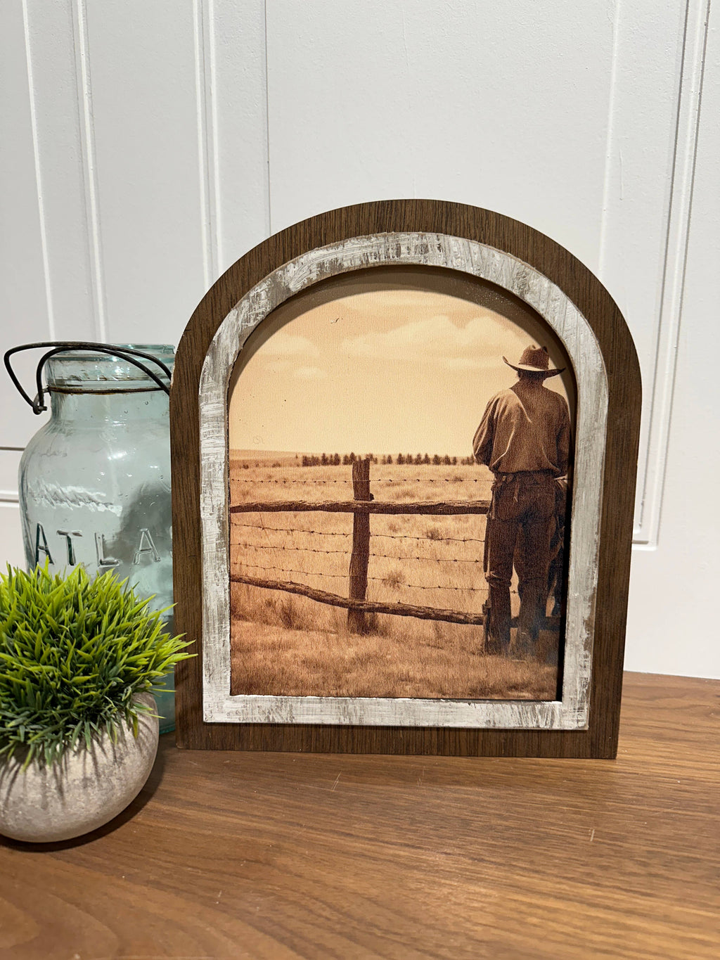 Cowboy looking over his land: Small