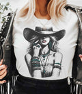 Turquoise Cowgirl: Yes / Sand T-Shirt / Small