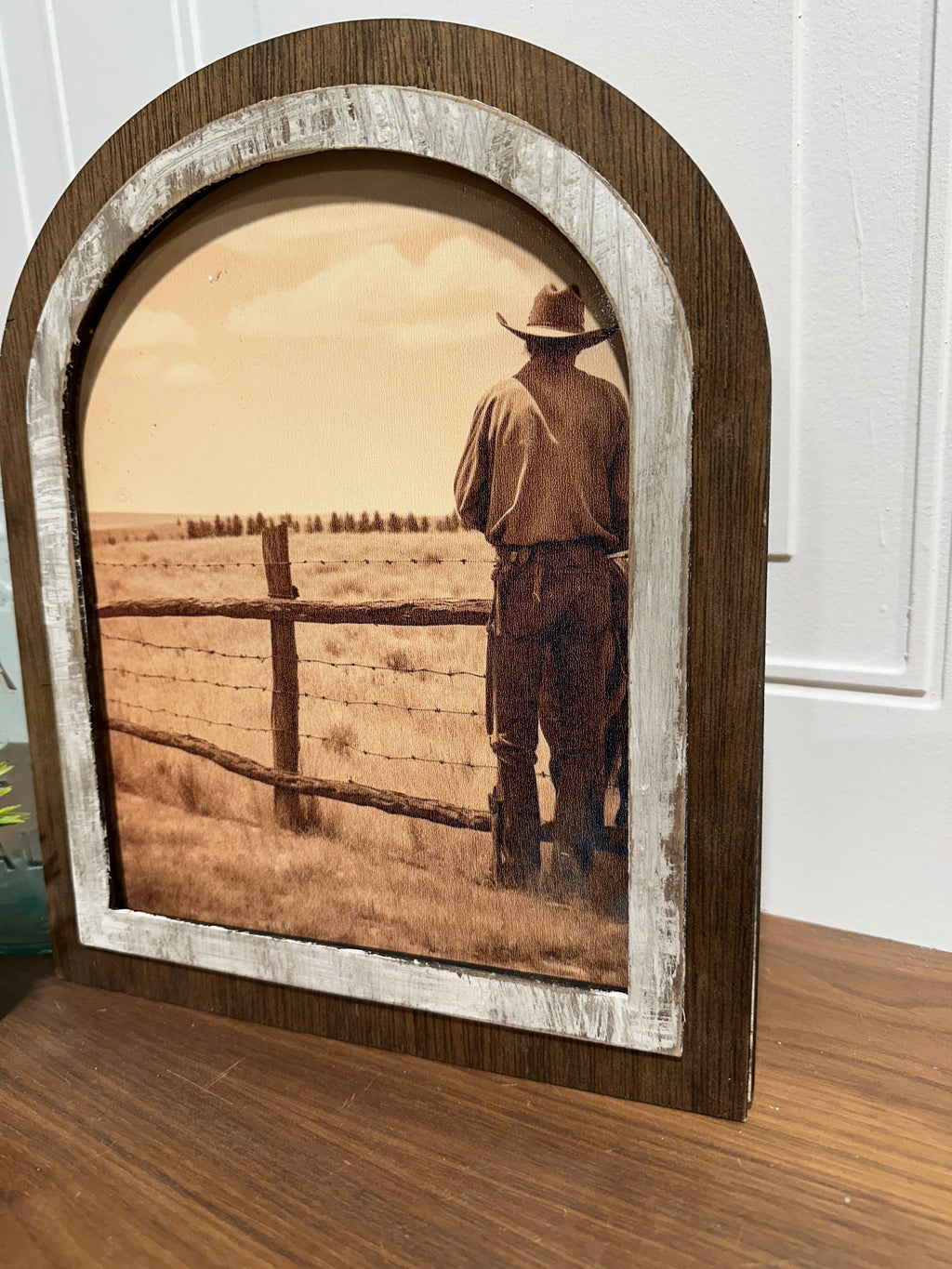 Cowboy looking over his land: Small