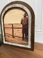 Cowboy looking over his land: Small