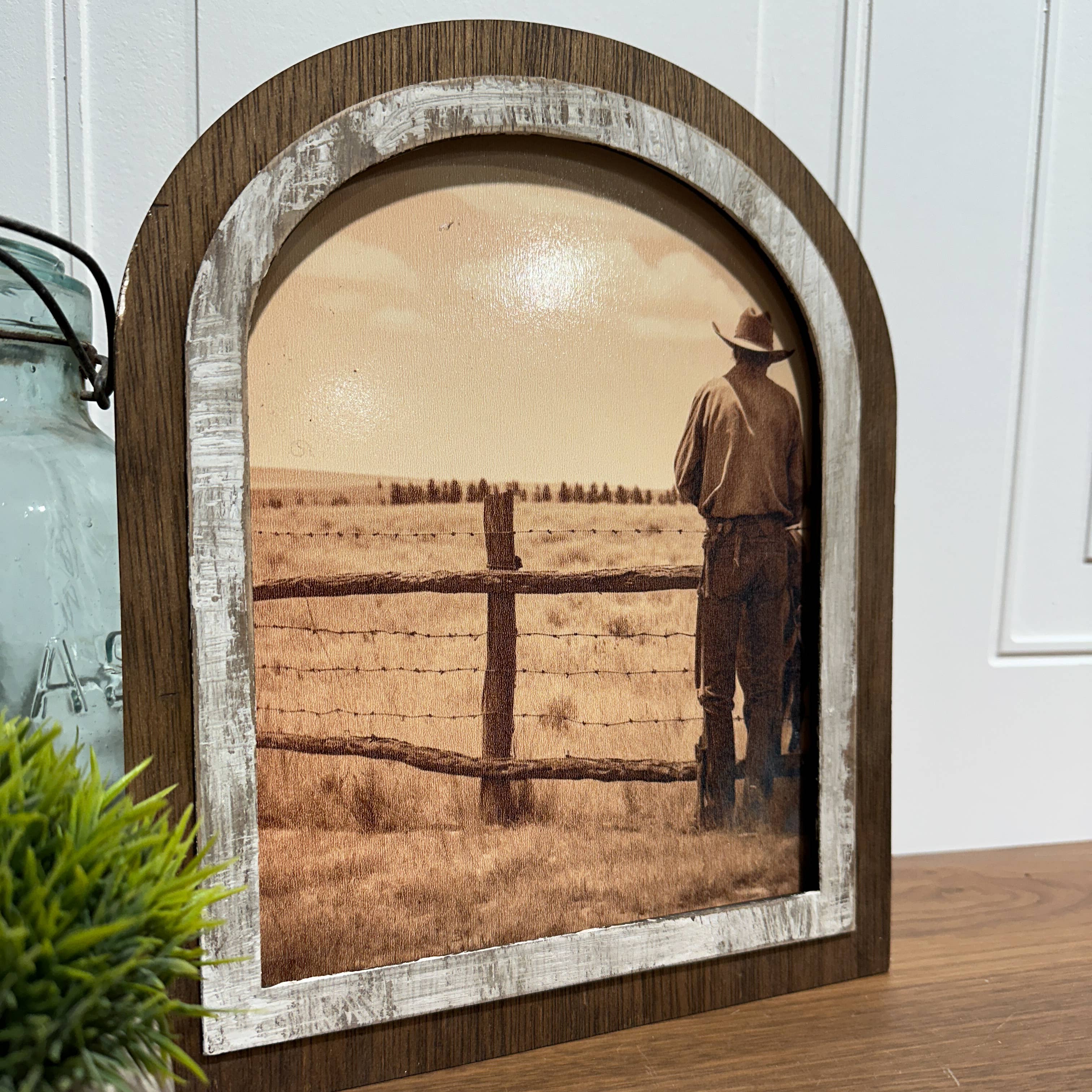 Cowboy looking over his land: Small
