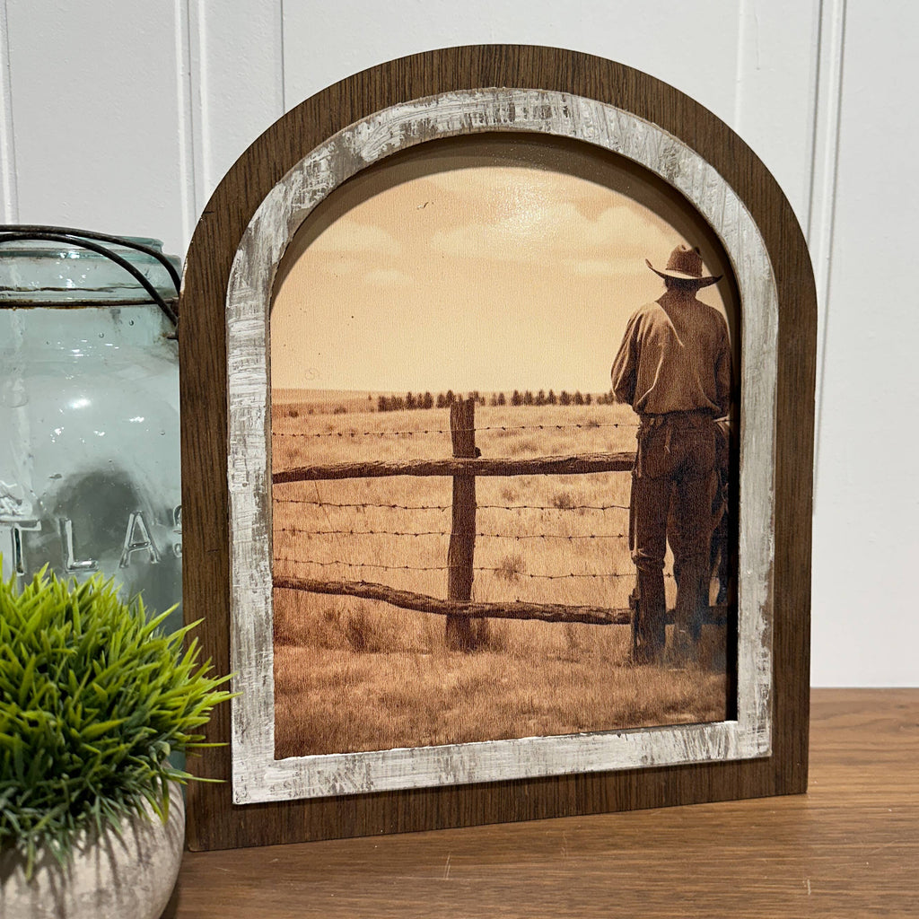 Cowboy looking over his land: Small